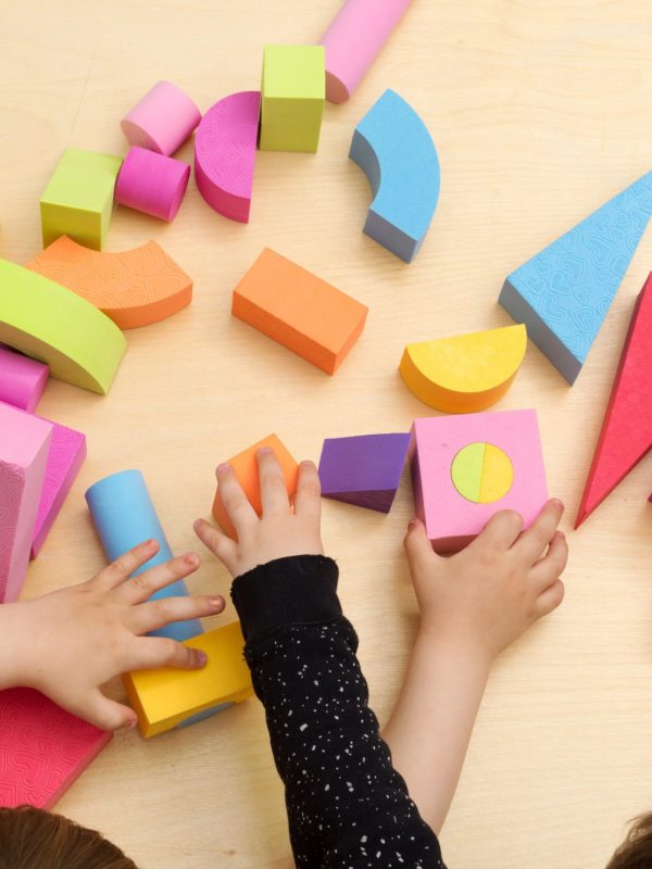 children-sharing-and-playing-with-toys